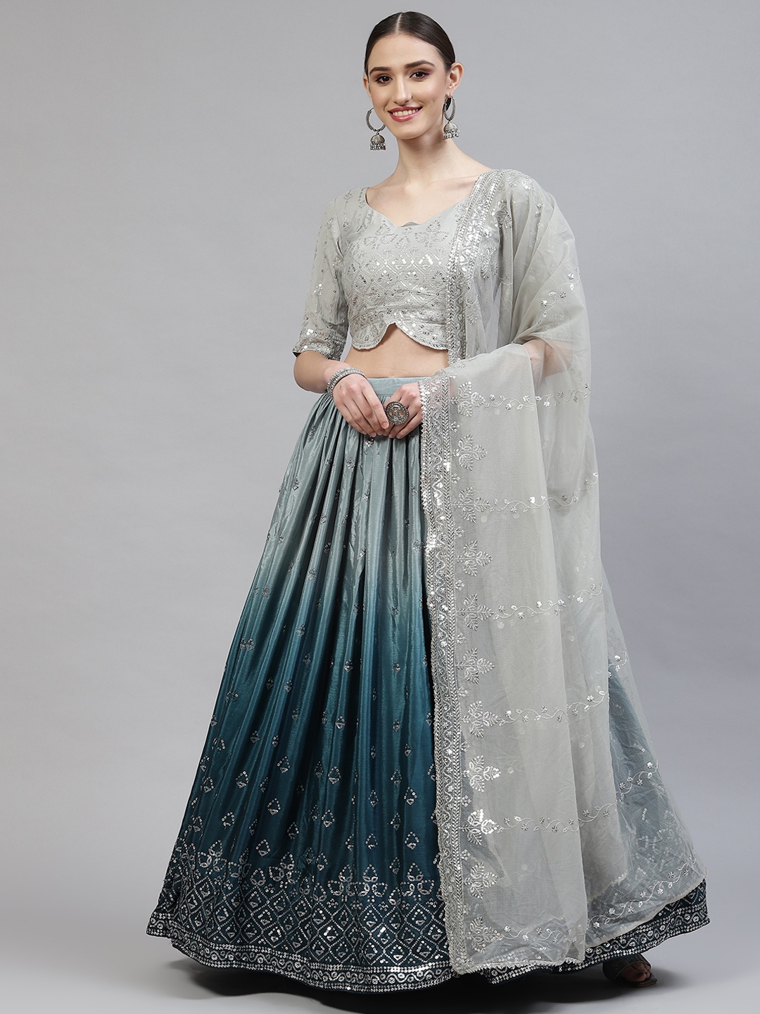 SHUBHKALA Grey & Teal Blue Embroidered Semi-Stitched Lehenga & Blouse With Dupatta
SHUBHKALA Grey & Teal Blue Embroidered Semi-Stitched Lehenga & Blouse With Dupatta