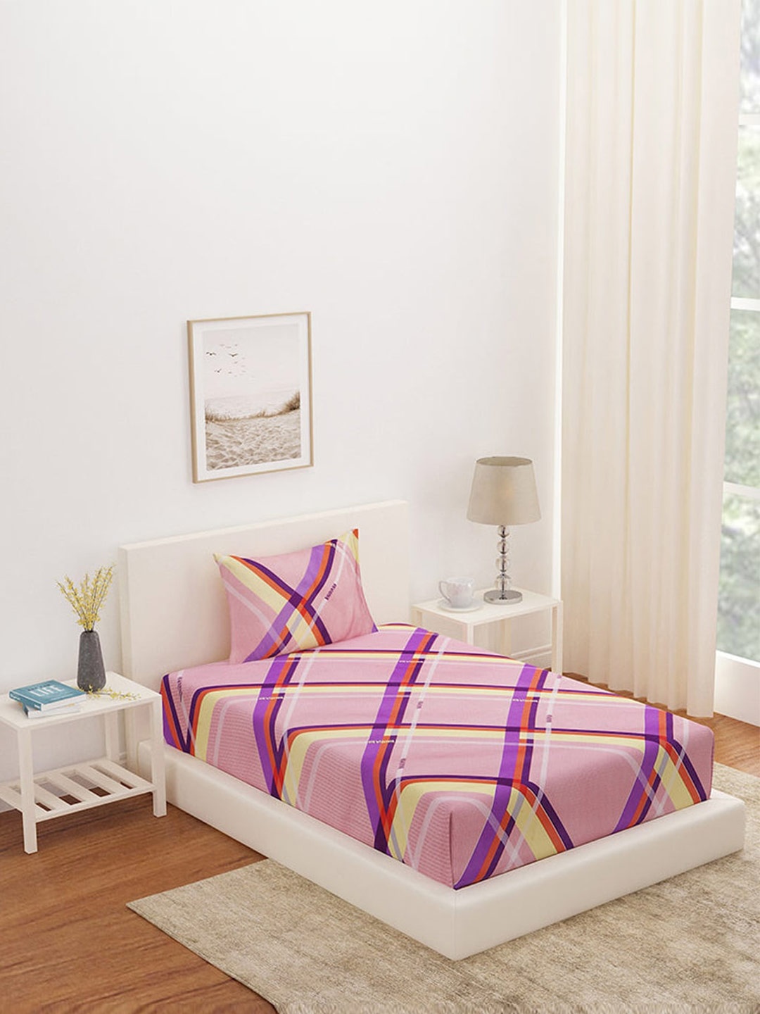 Athome by Nilkamal Pink & Purple Geometric 180 TC Single Bedsheet with 2 Pillow Covers
Athome by Nilkamal Pink & Purple Geometric 180 TC Single Bedsheet with 2 Pillow Covers