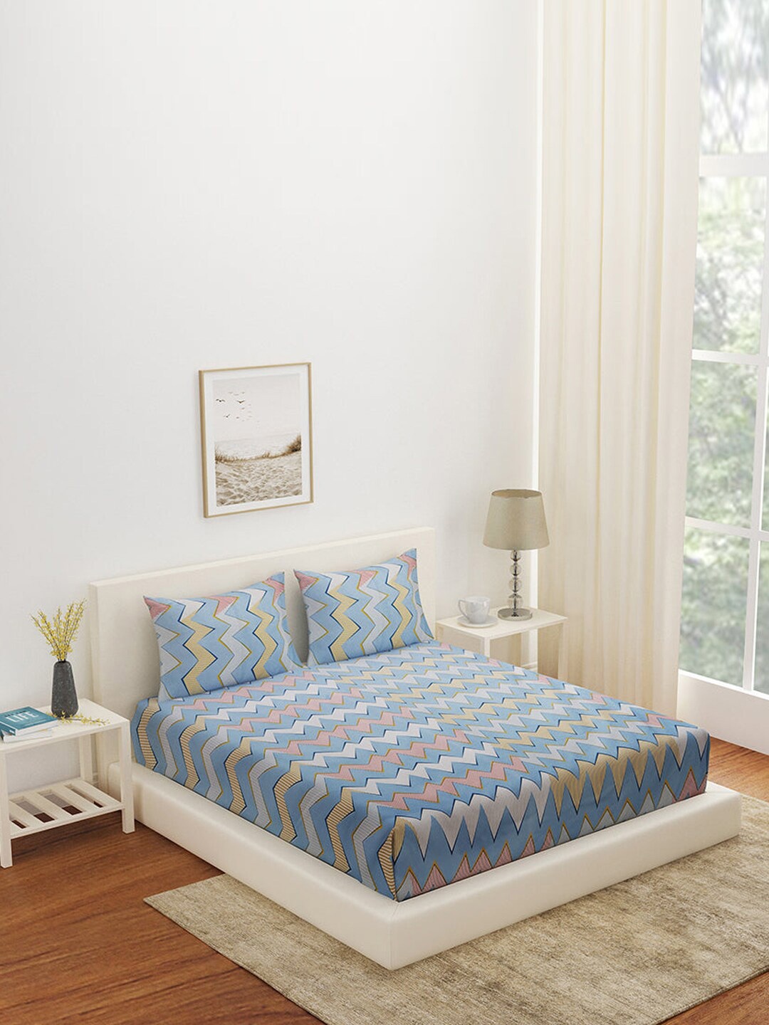 Athome by Nilkamal Blue & White Geometric 180 TC Queen Bedsheet with 2 Pillow Covers
Athome by Nilkamal Blue & White Geometric 180 TC Queen Bedsheet with 2 Pillow Covers