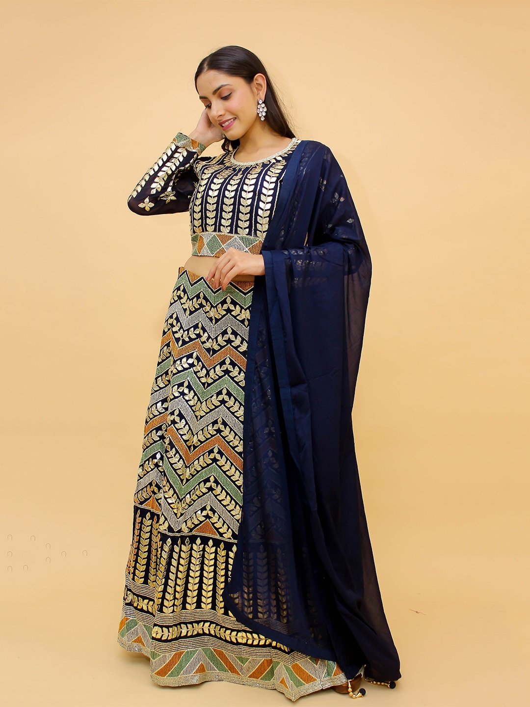 Fusionic Navy Blue & Gold-Toned Embroidered Semi-Stitched Lehenga & Unstitched Blouse With
Fusionic Navy Blue & Gold-Toned Embroidered Semi-Stitched Lehenga & Unstitched Blouse With