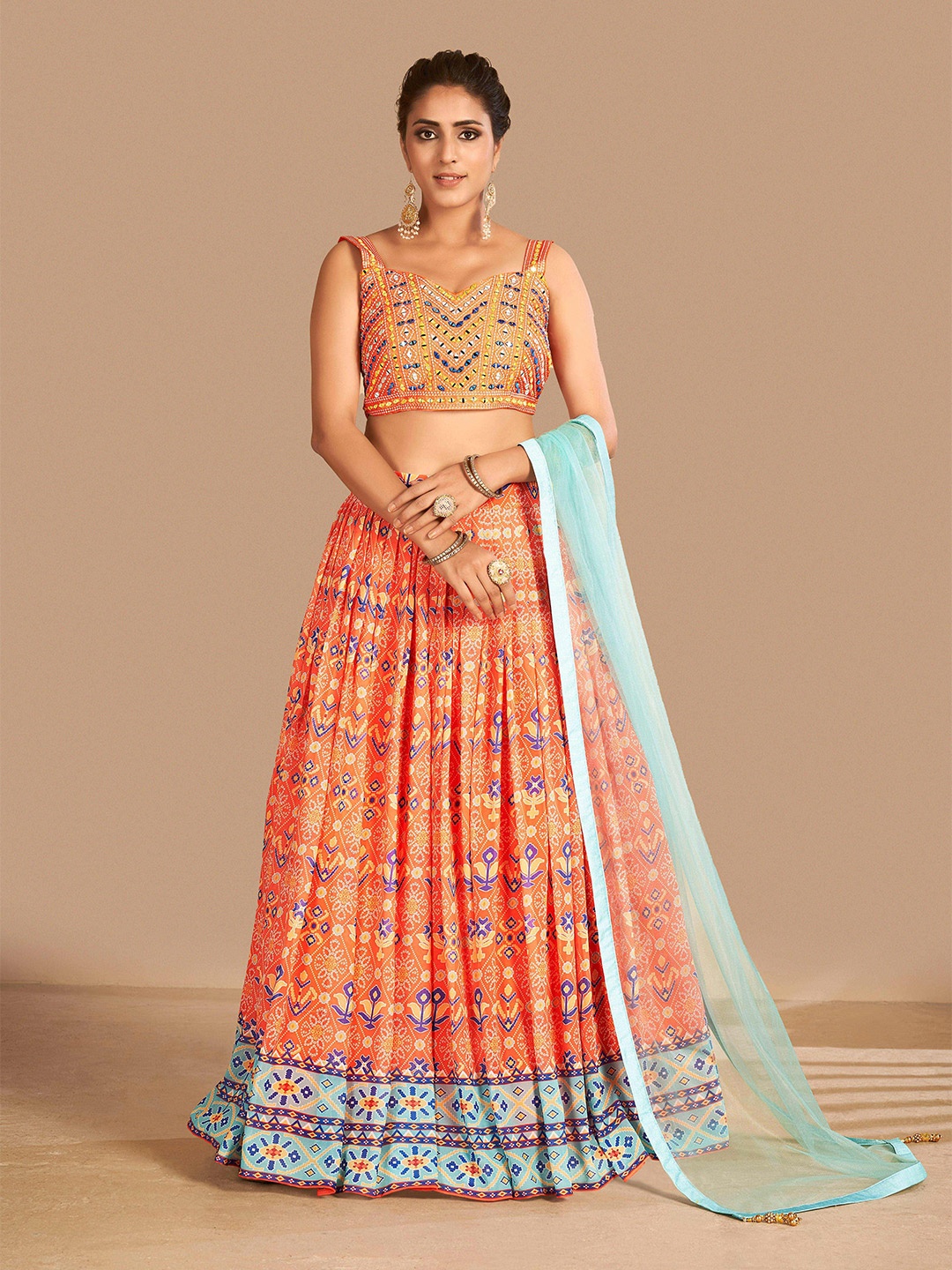 Fusionic Orange & Blue Embroidered Semi-Stitched Lehenga & Unstitched Blouse With Dupatta
Fusionic Orange & Blue Embroidered Semi-Stitched Lehenga & Unstitched Blouse With Dupatta