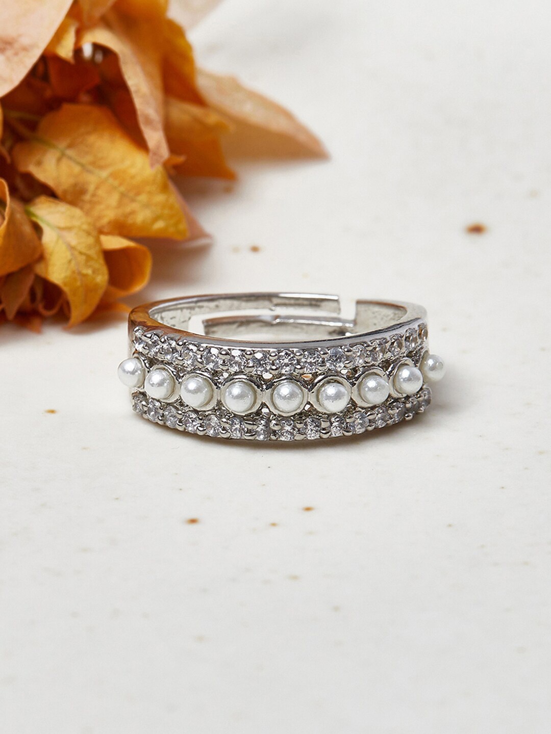 Voylla Women Silver-Plated White Cz Stone-Studded Pearl Beaded Adjustable Finger Ring
Voylla Women Silver-Plated White Cz Stone-Studded Pearl Beaded Adjustable Finger Ring