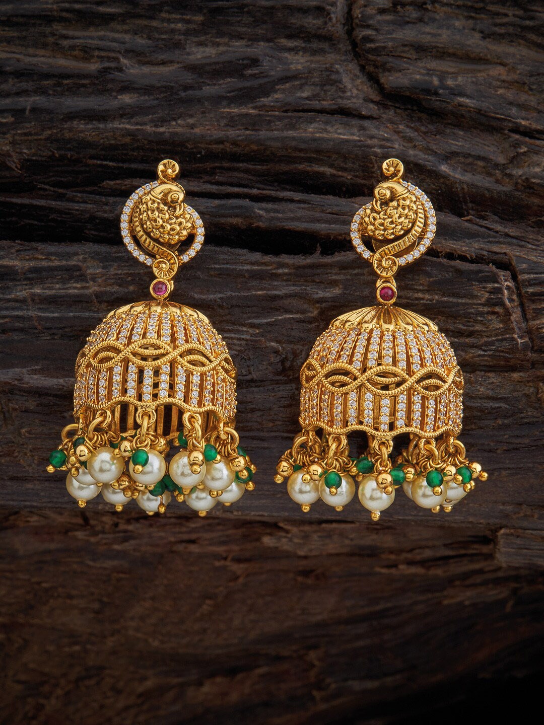 Kushal's Fashion Jewellery White & 92.5 Pure Silver Gold-Plated Peacock Jhumkas Earrings
Kushal's Fashion Jewellery White & 92.5 Pure Silver Gold-Plated Peacock Jhumkas Earrings