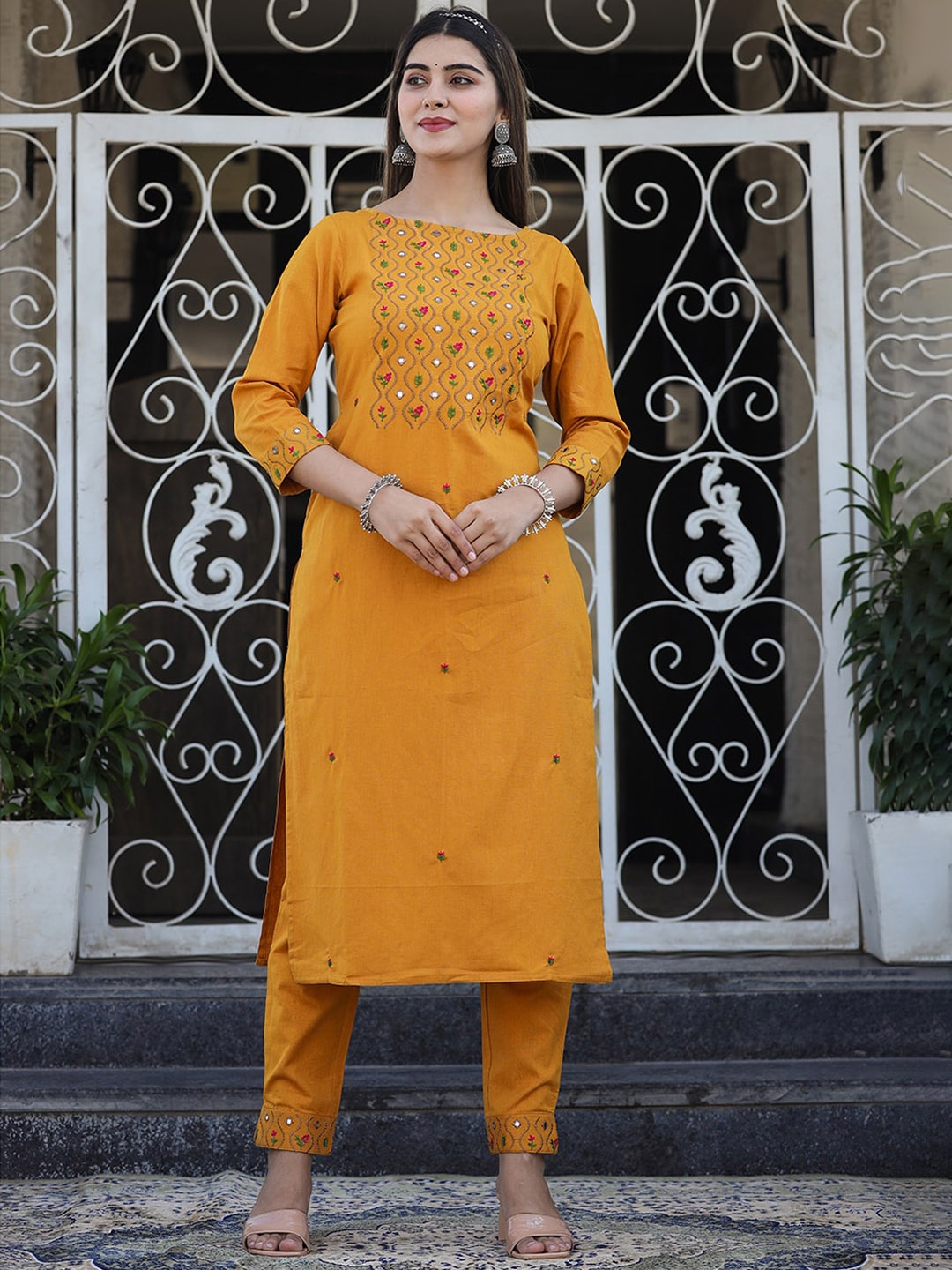 KAAJH Women Mustard Yellow Floral Embroidered Mirror Work Pure Cotton Kurta with Trousers
KAAJH Women Mustard Yellow Floral Embroidered Mirror Work Pure Cotton Kurta with Trousers
