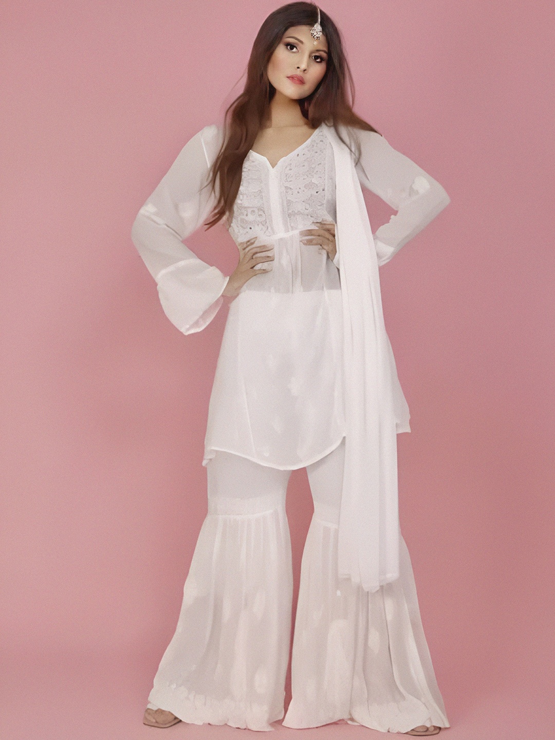 LABEL AISHWARYRIKA Women White Floral Embroidered Chikankari Kurta with Sharara & Dupatta
LABEL AISHWARYRIKA Women White Floral Embroidered Chikankari Kurta with Sharara & Dupatta