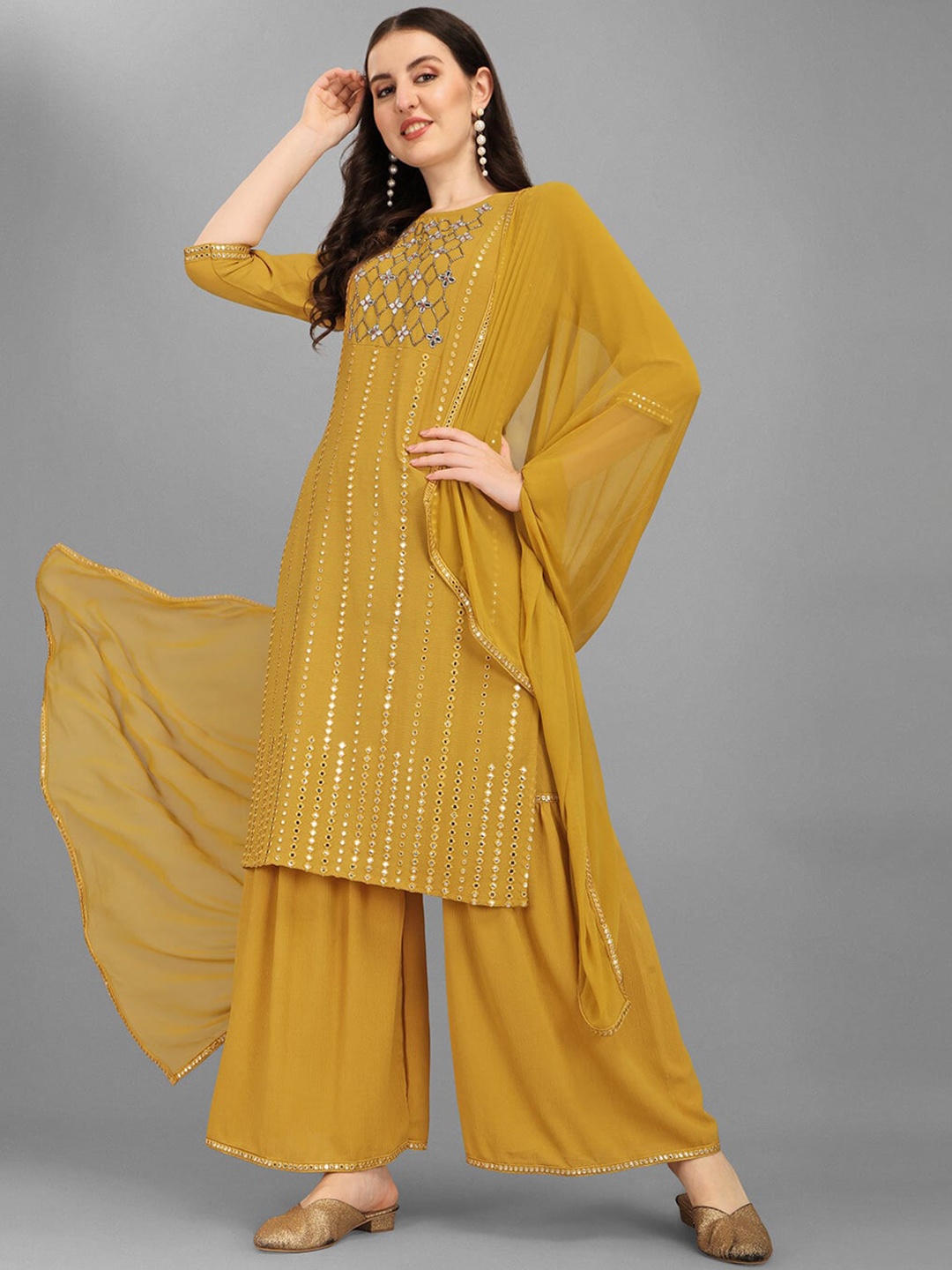 Berrylicious Women Mustard Yellow Embroidered Mirror Work Kurta with Sharara & Dupatta
Berrylicious Women Mustard Yellow Embroidered Mirror Work Kurta with Sharara & Dupatta