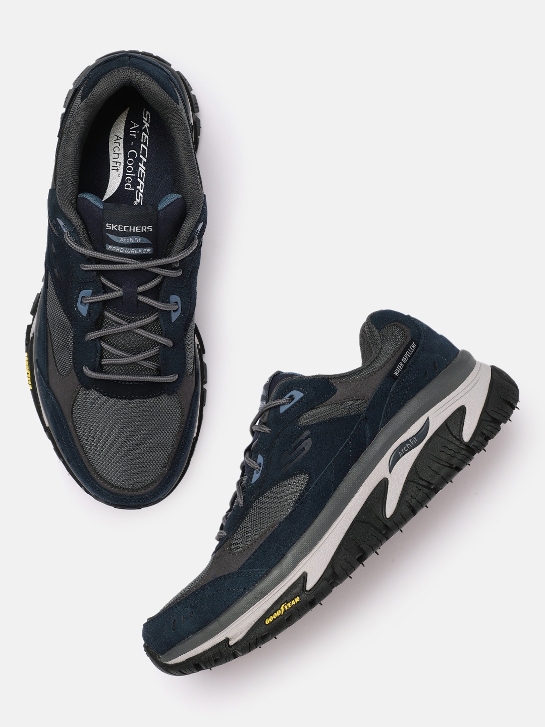 Skechers Men Solid Arch Fit Road Walker Water Repellent Regular Sneakers, Navy blue
Skechers Men Solid Arch Fit Road Walker Water Repellent Regular Sneakers, Navy blue