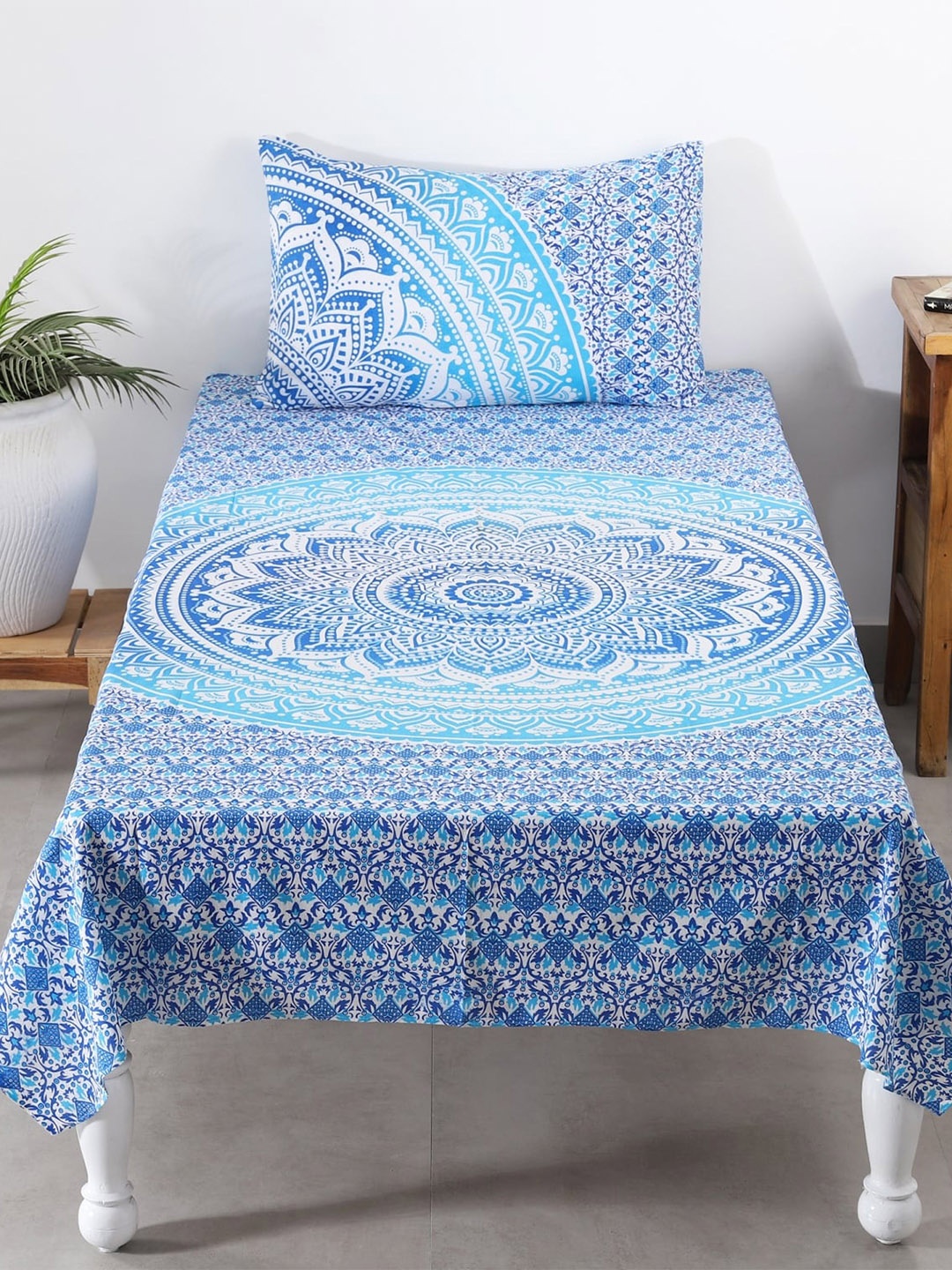 HANDICRAFT PALACE Blue & White Printed 144 TC Cotton Single Bedsheet with 1 Pillow Cover
HANDICRAFT PALACE Blue & White Printed 144 TC Cotton Single Bedsheet with 1 Pillow Cover