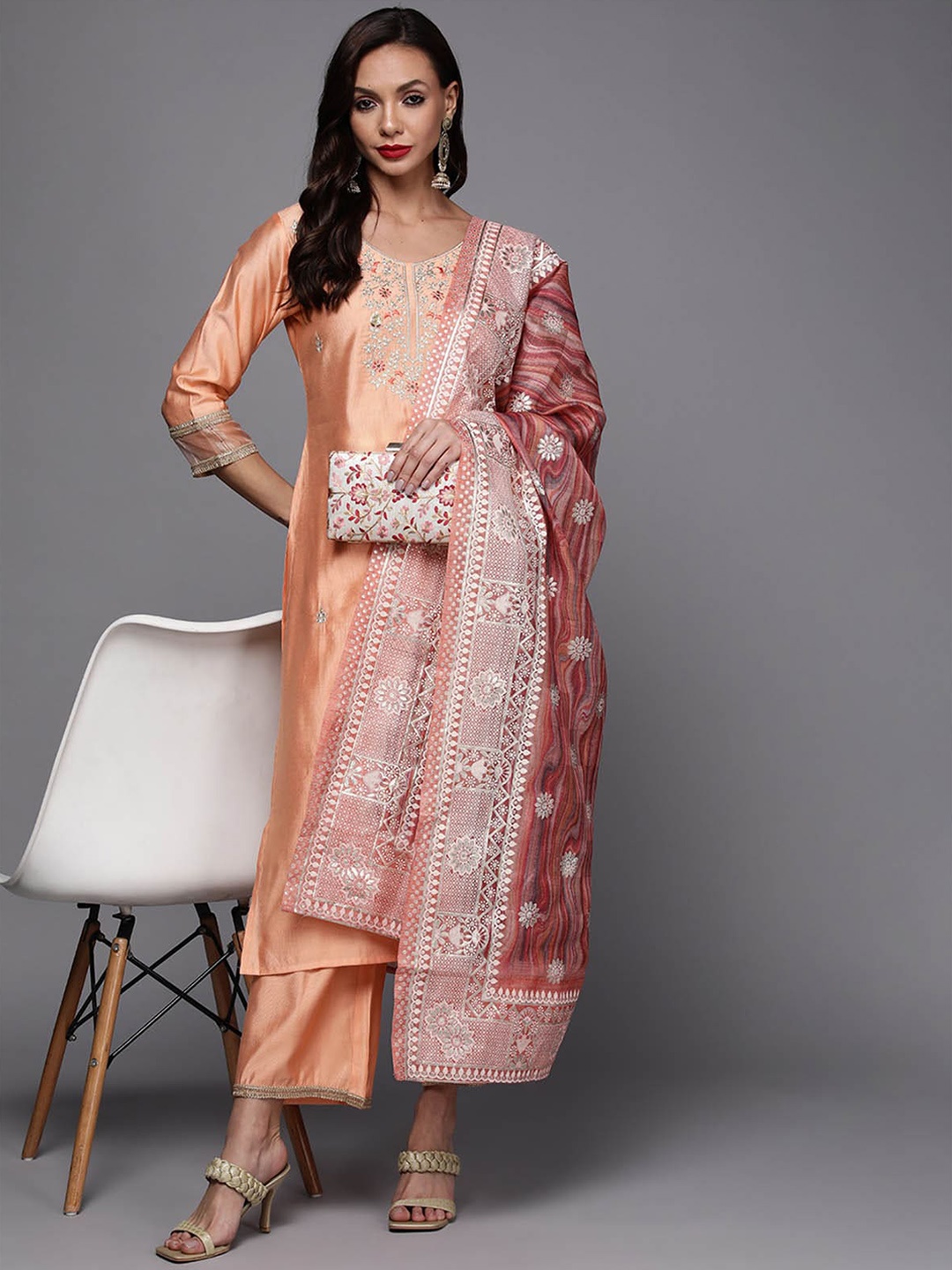 ODETTE Women Peach-Coloured Ethnic Motifs Embroidered Kurta with Palazzos & With Dupatta
ODETTE Women Peach-Coloured Ethnic Motifs Embroidered Kurta with Palazzos & With Dupatta