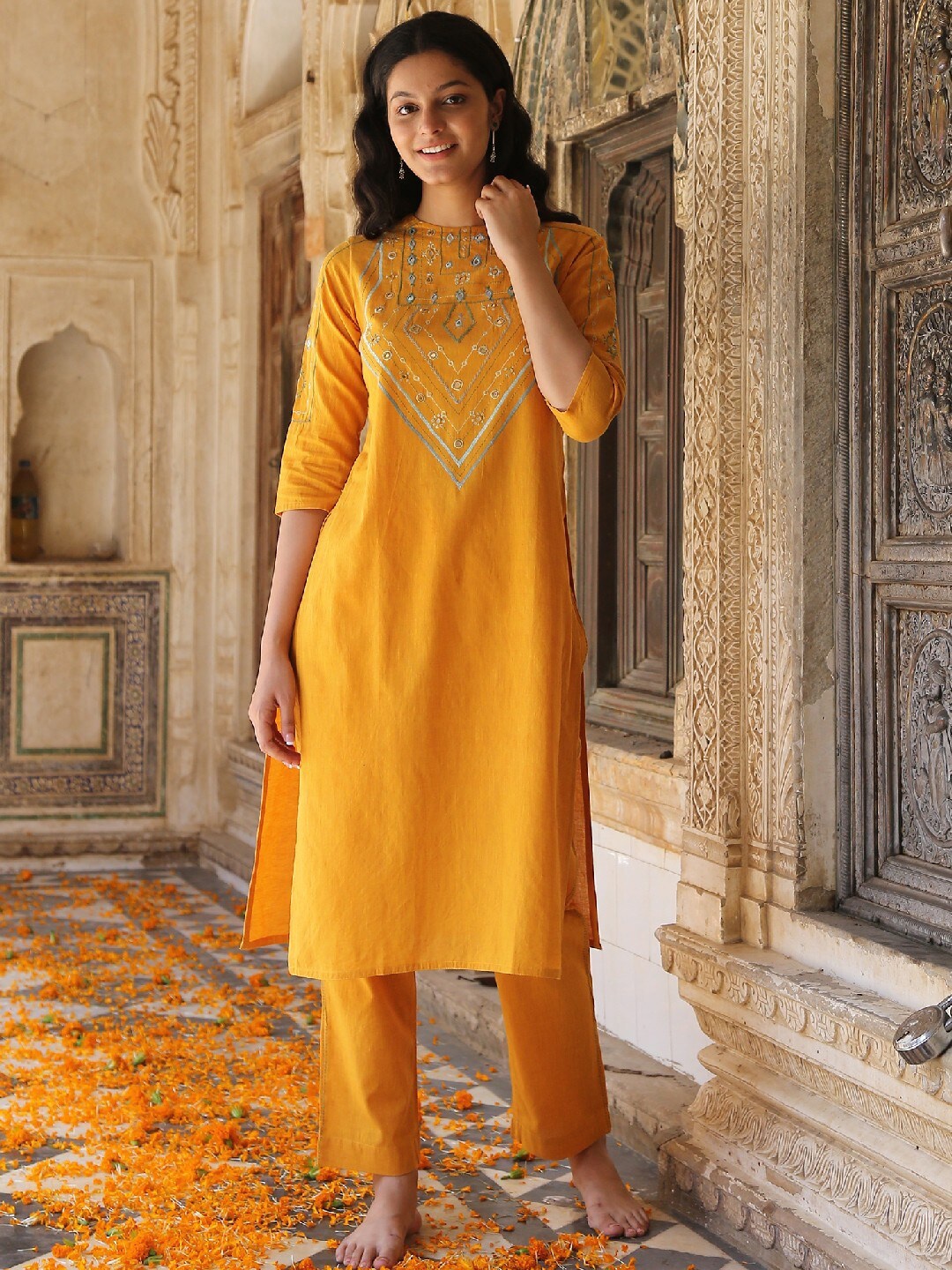 OKHAI Women Yellow Ethnic Motifs Embroidered Mirror Work Pure Cotton Kurta With Trousers
OKHAI Women Yellow Ethnic Motifs Embroidered Mirror Work Pure Cotton Kurta With Trousers