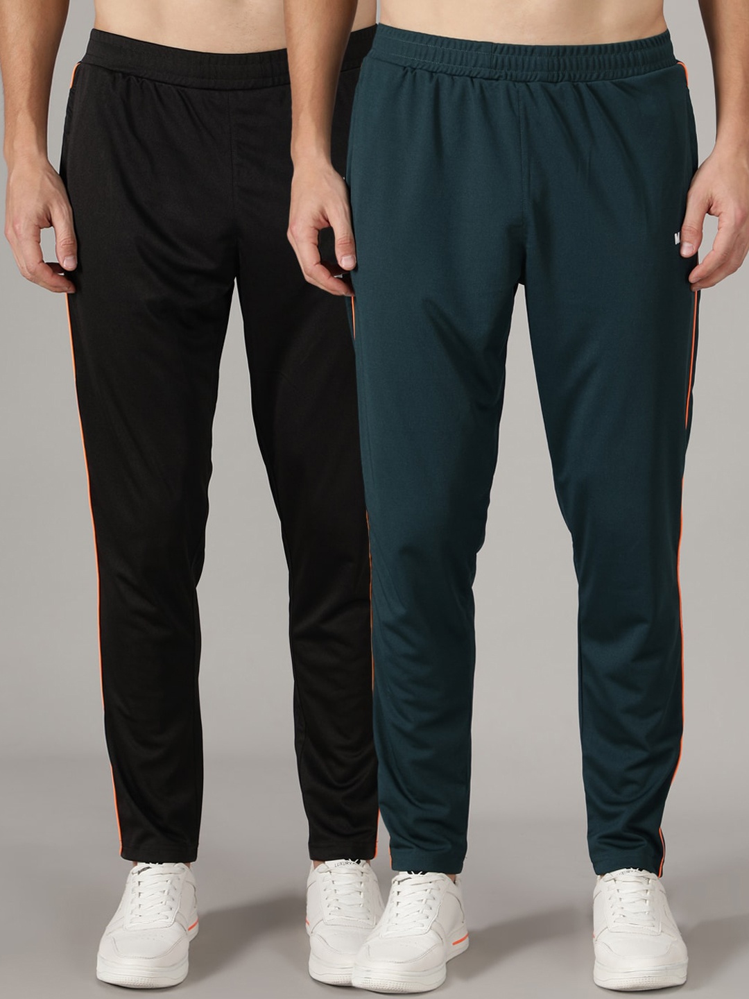 MKKO Men Pack Of 2 Black & Green Brand Logo Print Cotton Training & Gym Track Pants
MKKO Men Pack Of 2 Black & Green Brand Logo Print Cotton Training & Gym Track Pants