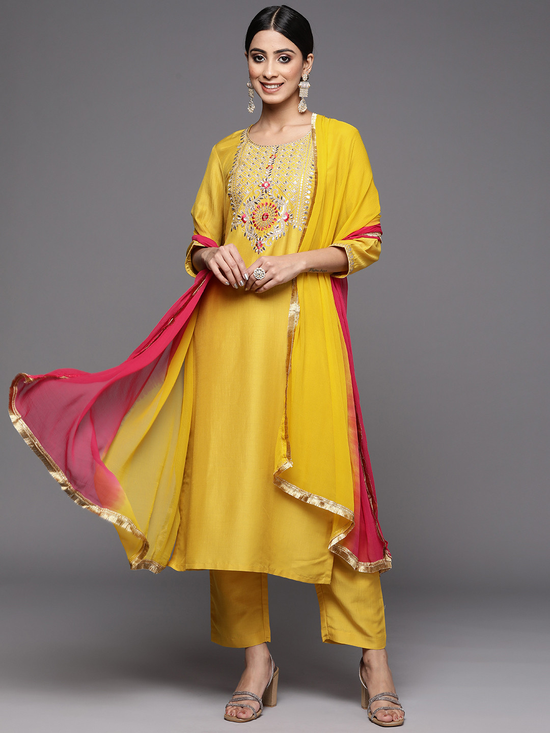 Varanga Women Yellow Ethnic Motifs Yoke Design Mirror Work Kurta with Trousers & With Dupatta
Varanga Women Yellow Ethnic Motifs Yoke Design Mirror Work Kurta with Trousers & With Dupatta