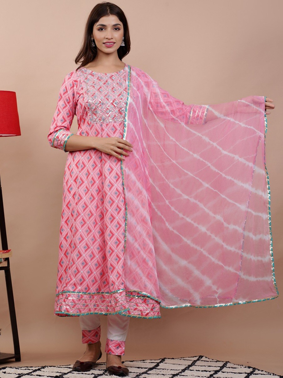 UNISETS Pink Ethnic Motifs Printed Panelled Sequinned Kurta with Trousers & With Dupatta
UNISETS Pink Ethnic Motifs Printed Panelled Sequinned Kurta with Trousers & With Dupatta