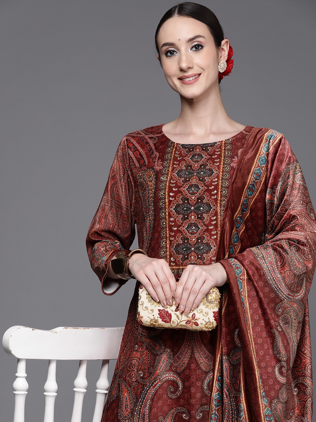 Indo Era Women Paisley Embroidered Sequinned Velvet Kurta with Trousers & With Dupatta, Brown
Indo Era Women Paisley Embroidered Sequinned Velvet Kurta with Trousers & With Dupatta, Brown