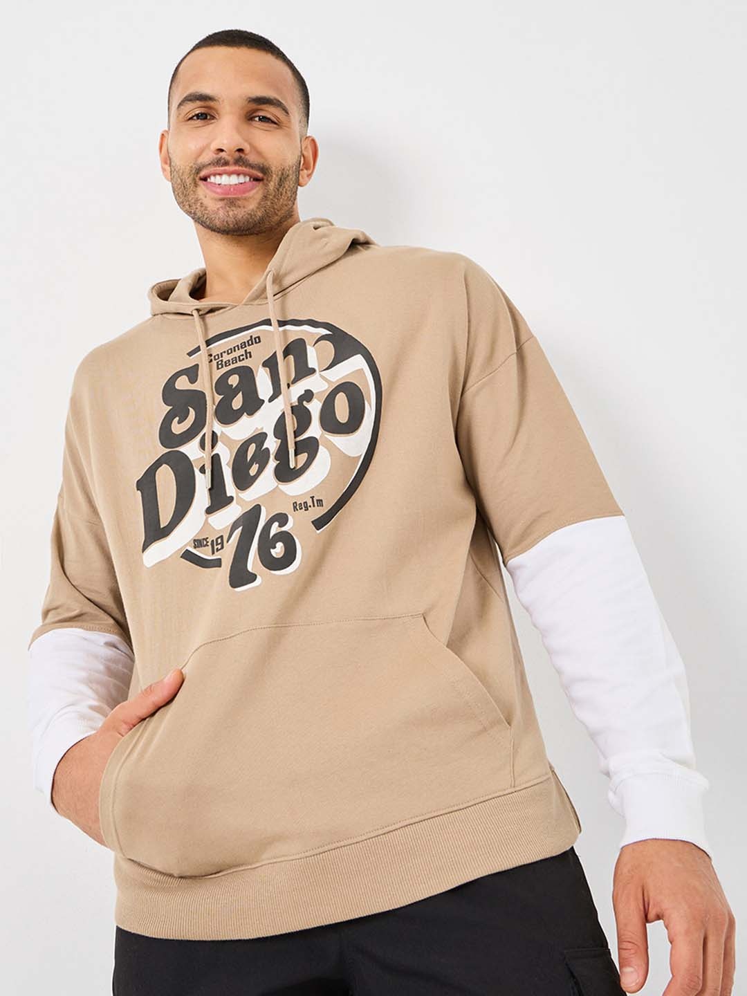 Styli Printed Hooded Colorblock Sleeve Detail Oversized Hoodie with Puff Chest Print, Beige
Styli Printed Hooded Colorblock Sleeve Detail Oversized Hoodie with Puff Chest Print, Beige