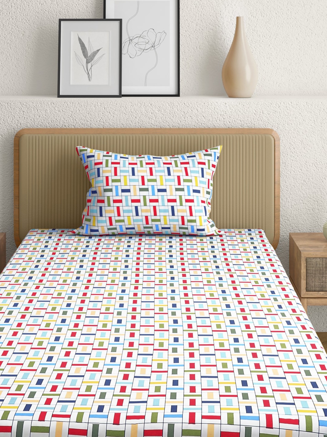 Anaqa by Pantaloons White & Blue Geometric 144 TC Single Bedsheet with 1 Pillow Covers
Anaqa by Pantaloons White & Blue Geometric 144 TC Single Bedsheet with 1 Pillow Covers