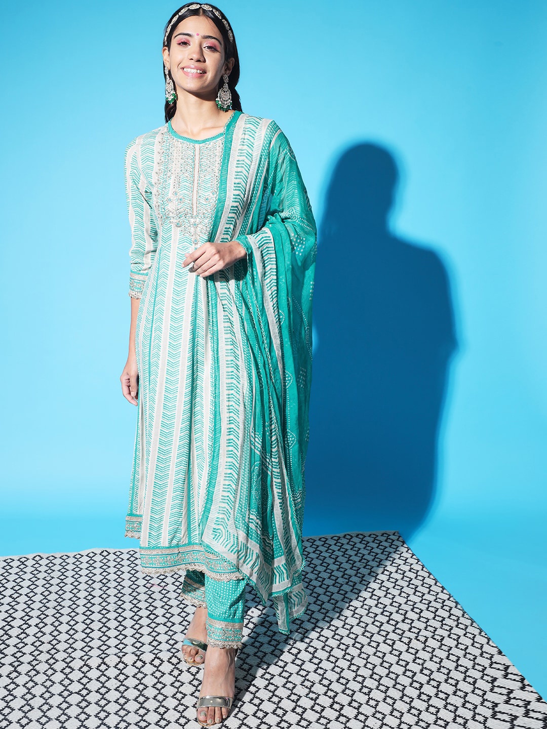 KALINI Women Yoke Design Thread Work Kurta with Trouser & With Dupatta, Turquoise blue
KALINI Women Yoke Design Thread Work Kurta with Trouser & With Dupatta, Turquoise blue