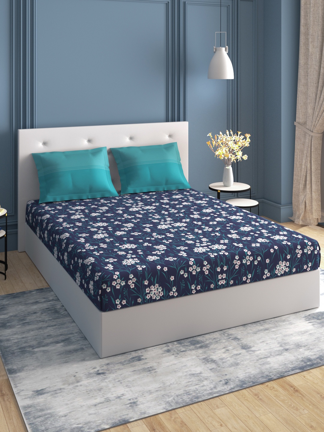Trident Moments Blue & White Floral 120 TC Cotton Queen Bedsheet with 2 Pillow Covers
Trident Moments Blue & White Floral 120 TC Cotton Queen Bedsheet with 2 Pillow Covers