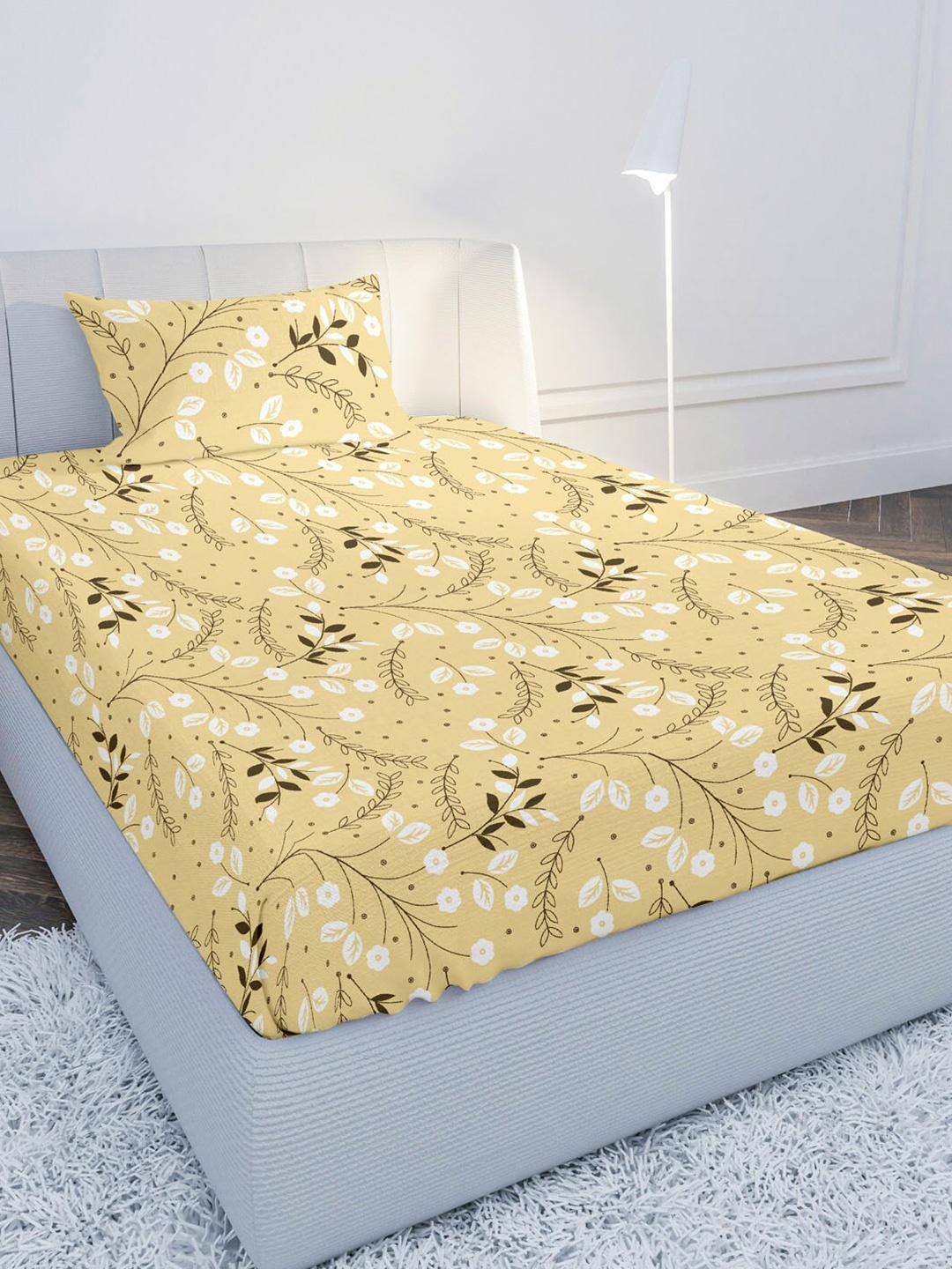 MAYFAIR HOMES LONDON Yellow & White Floral 104 TC Cotton Bedsheet with 1 Pillow Cover
MAYFAIR HOMES LONDON Yellow & White Floral 104 TC Cotton Bedsheet with 1 Pillow Cover