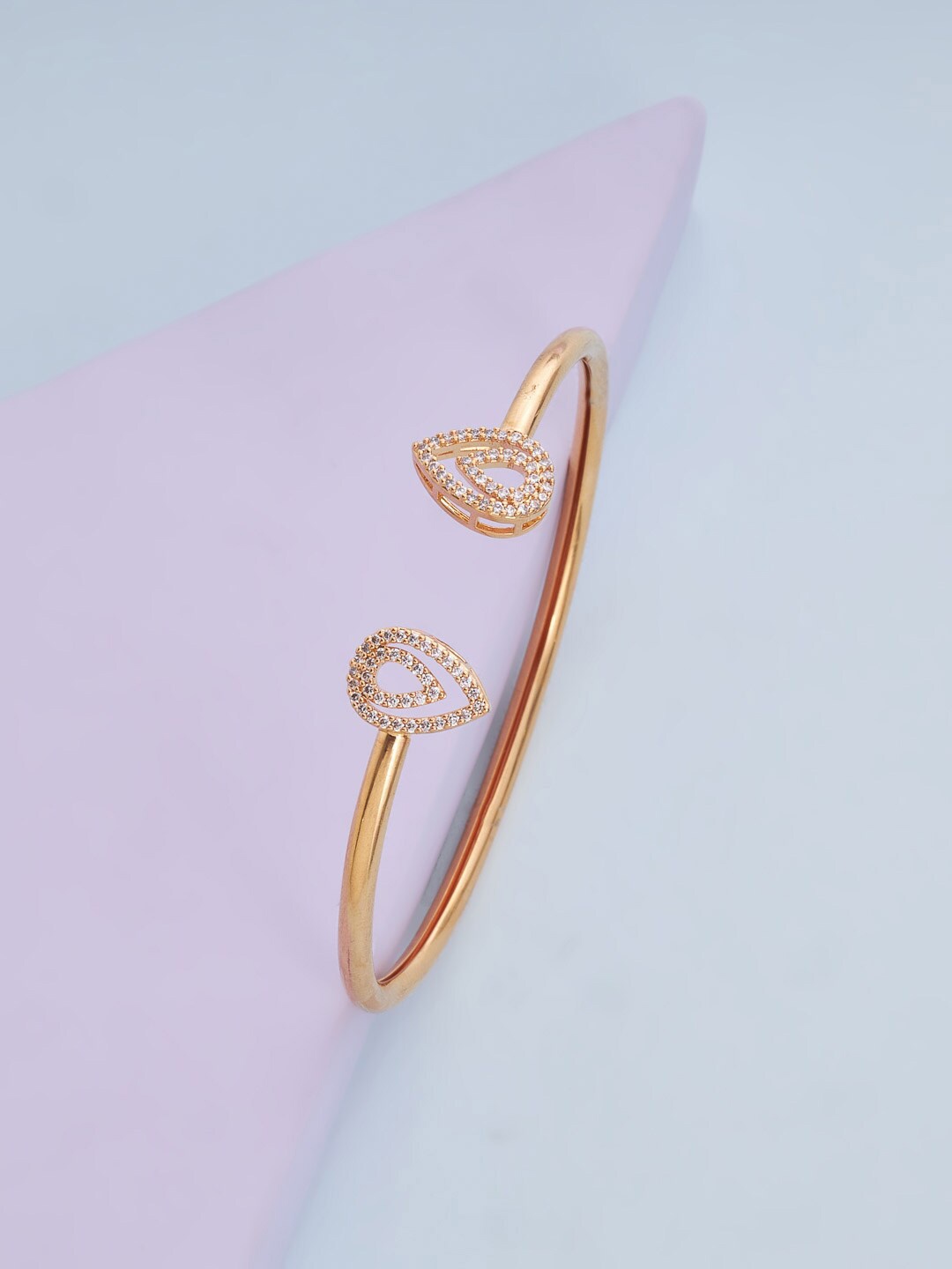Kushal's Fashion Jewellery Women White Cubic Zirconia Gold-Plated Kada Bracelet
Kushal's Fashion Jewellery Women White Cubic Zirconia Gold-Plated Kada Bracelet