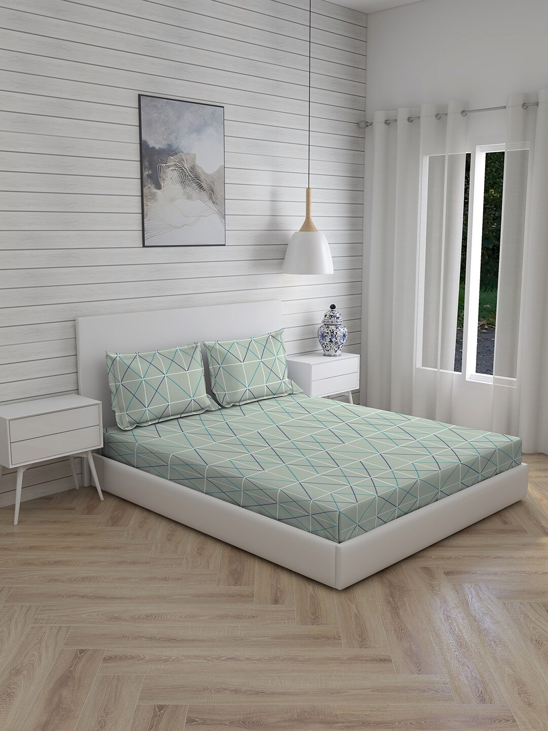 Boutique Living India Green & White 220 TC Cotton Super King Bedsheet with 2 Pillow Covers
Boutique Living India Green & White 220 TC Cotton Super King Bedsheet with 2 Pillow Covers