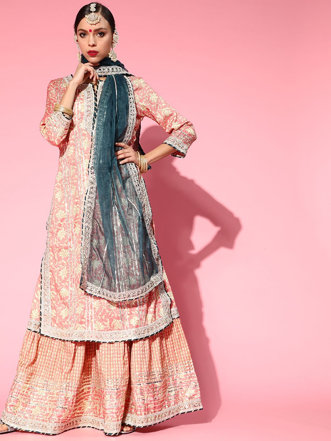 Ishin Women Peach-Coloured Floral Printed Gotta Patti Kurta with Sharara & With Dupatta
Ishin Women Peach-Coloured Floral Printed Gotta Patti Kurta with Sharara & With Dupatta