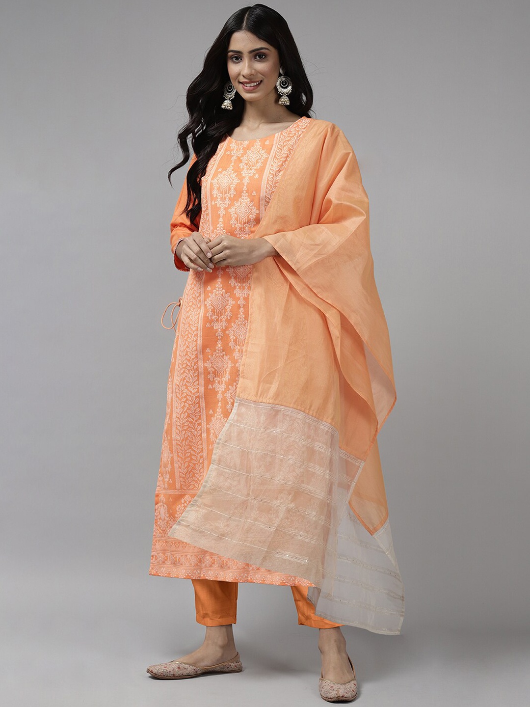 Indo Era Women Floral Printed Chanderi Silk Kurta with Trousers & With Dupatta, Peach
Indo Era Women Floral Printed Chanderi Silk Kurta with Trousers & With Dupatta, Peach