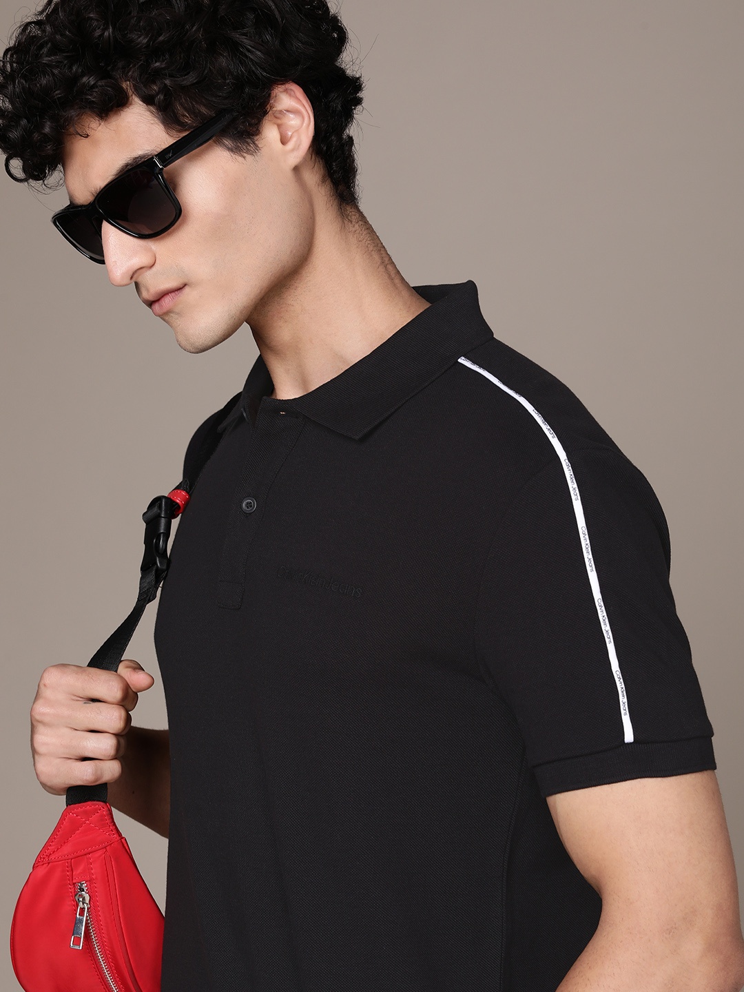 Calvin Klein Jeans Men Pure Cotton Polo Collar T-shirt With Piping Detail On Sleeves, Black
Calvin Klein Jeans Men Pure Cotton Polo Collar T-shirt With Piping Detail On Sleeves, Black