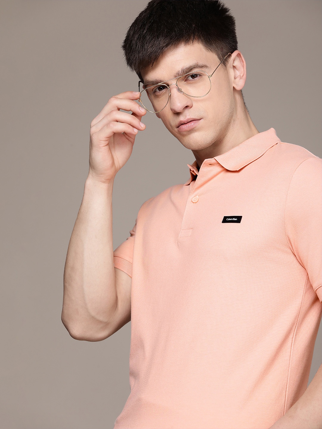 Calvin Klein Jeans Men Polo Collar Slim Fit T-shirt With Applique Detail, Peach
Calvin Klein Jeans Men Polo Collar Slim Fit T-shirt With Applique Detail, Peach