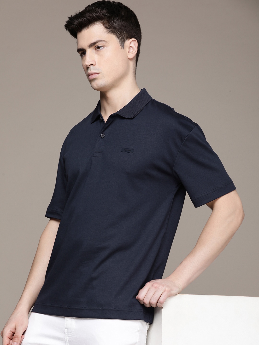 Calvin Klein Jeans Polo Collar Drop-Shoulder Sleeves Comfort Fit Pure Cotton T-shirt, Navy blue
Calvin Klein Jeans Polo Collar Drop-Shoulder Sleeves Comfort Fit Pure Cotton T-shirt, Navy blue