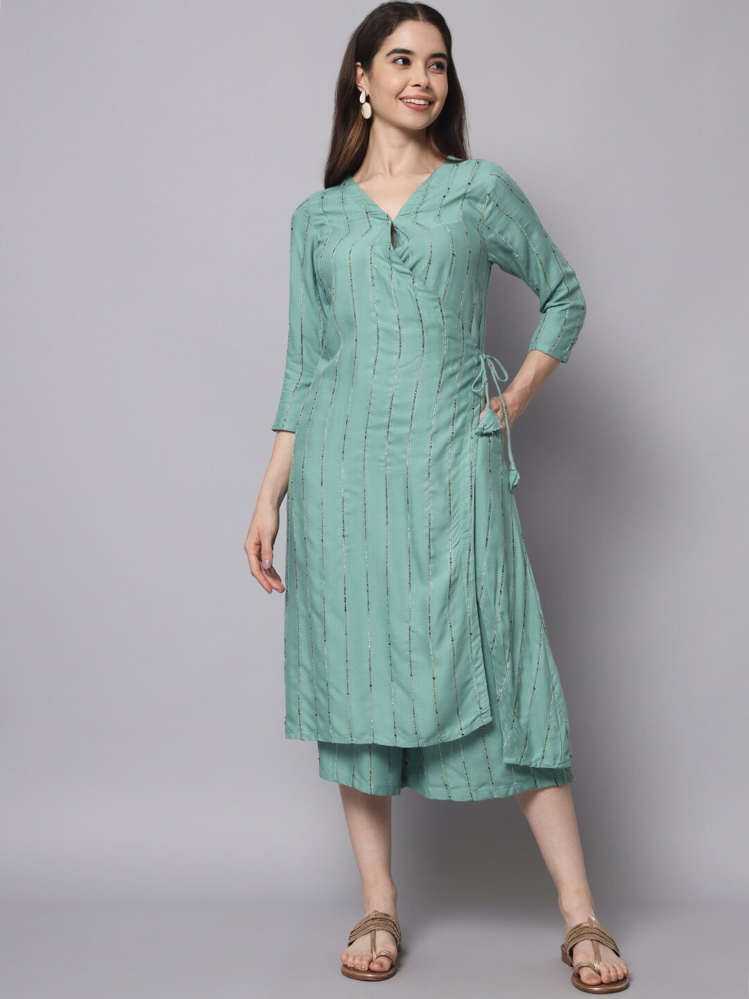 Myshka Women Embroidered Angrakha Beads and Stones Pure Cotton Kurta with Trousers, Green
Myshka Women Embroidered Angrakha Beads and Stones Pure Cotton Kurta with Trousers, Green