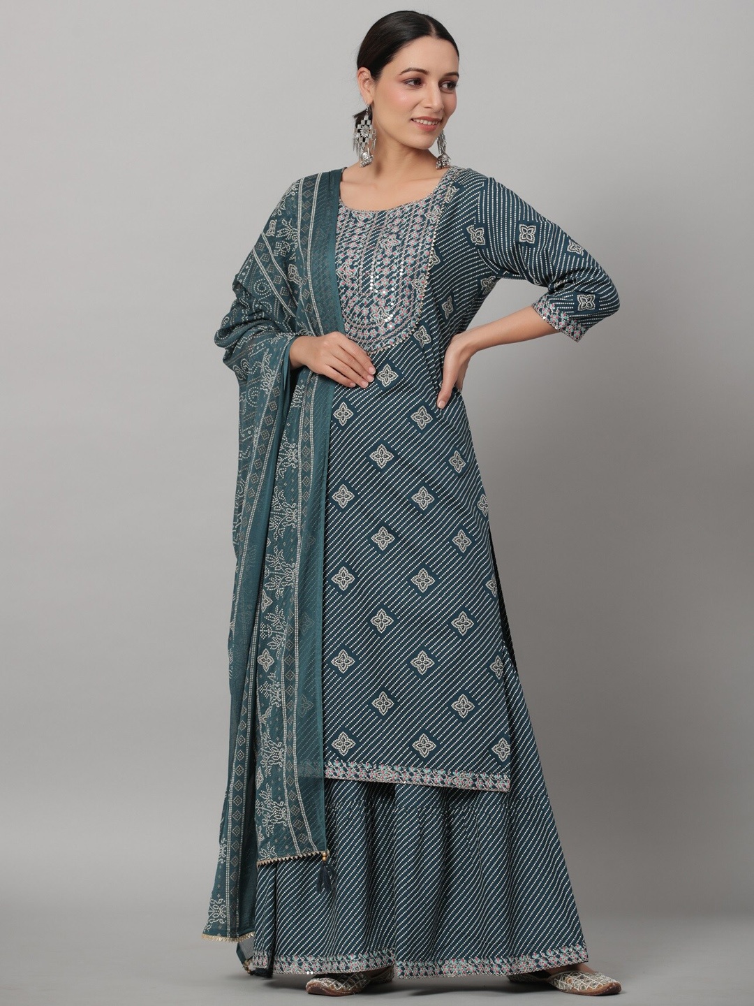 Juniper Women Bandhani Printed Thread Work Kurta with Sharara & With Dupatta, Blue
Juniper Women Bandhani Printed Thread Work Kurta with Sharara & With Dupatta, Blue
