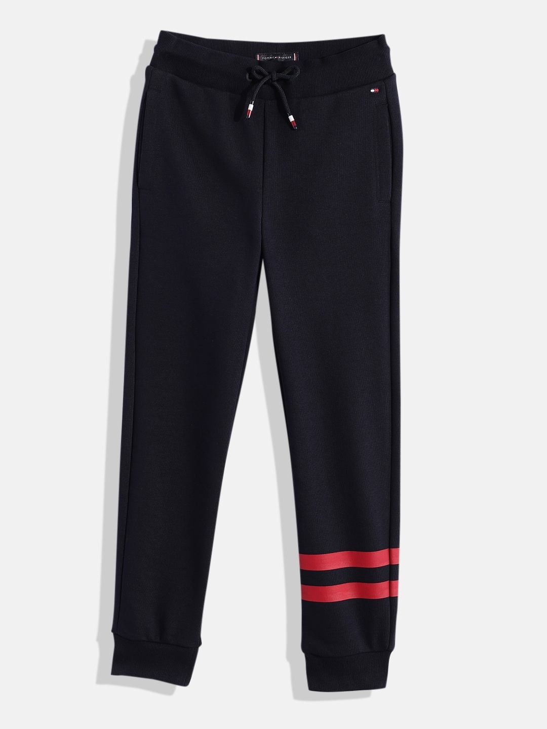 Tommy Hilfiger Boys Solid Regular Fit Mid-Rise Knitted Sweat Joggers With Striped Detail, Navy blue
Tommy Hilfiger Boys Solid Regular Fit Mid-Rise Knitted Sweat Joggers With Striped Detail, Navy blue