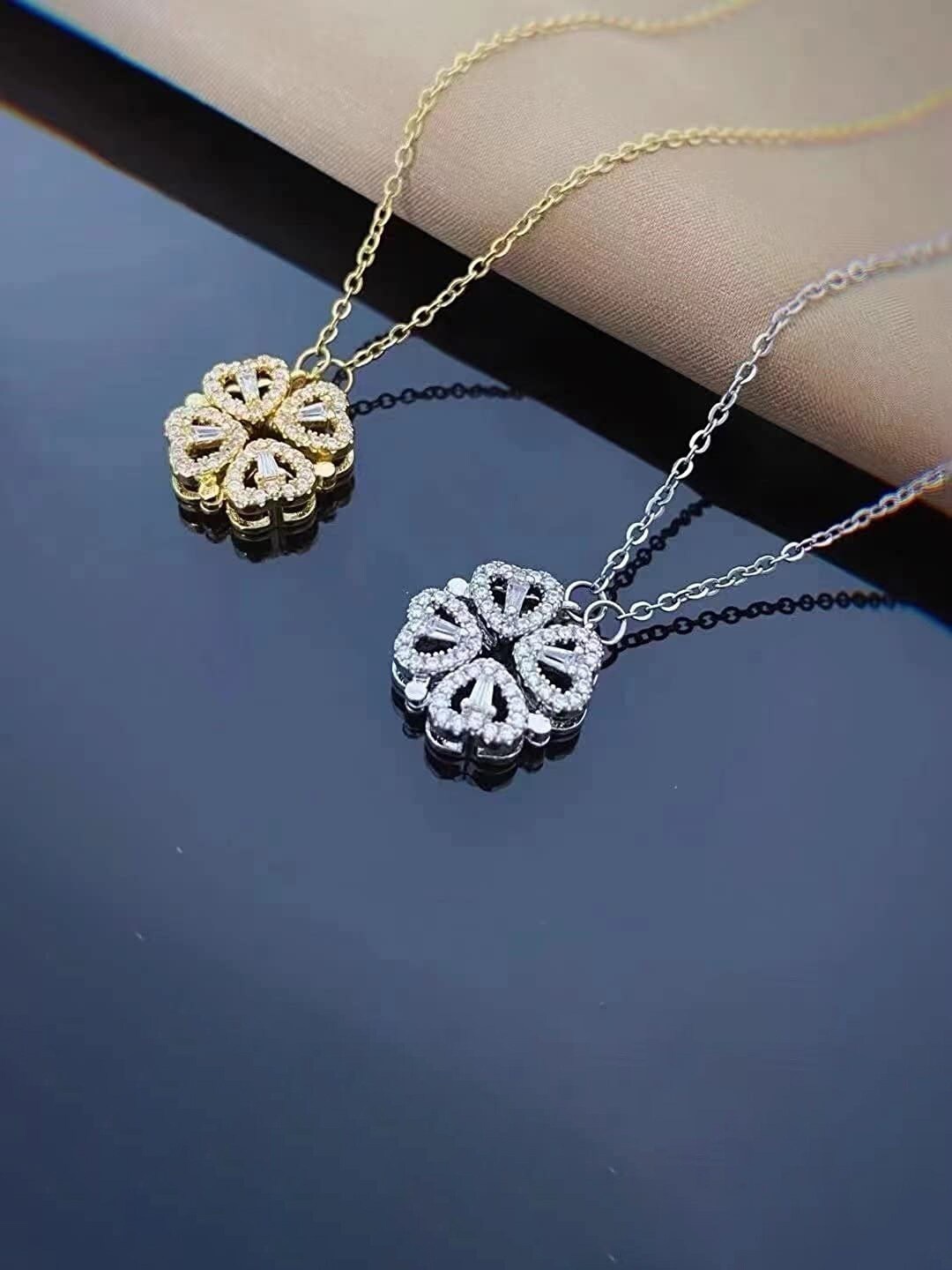 Jewels Galaxy Set Of 2 Dual-Toned & Stone-Studded 4 Clover Openable Magnetic Pendants With Chain, Gold
Jewels Galaxy Set Of 2 Dual-Toned & Stone-Studded 4 Clover Openable Magnetic Pendants With Chain, Gold
