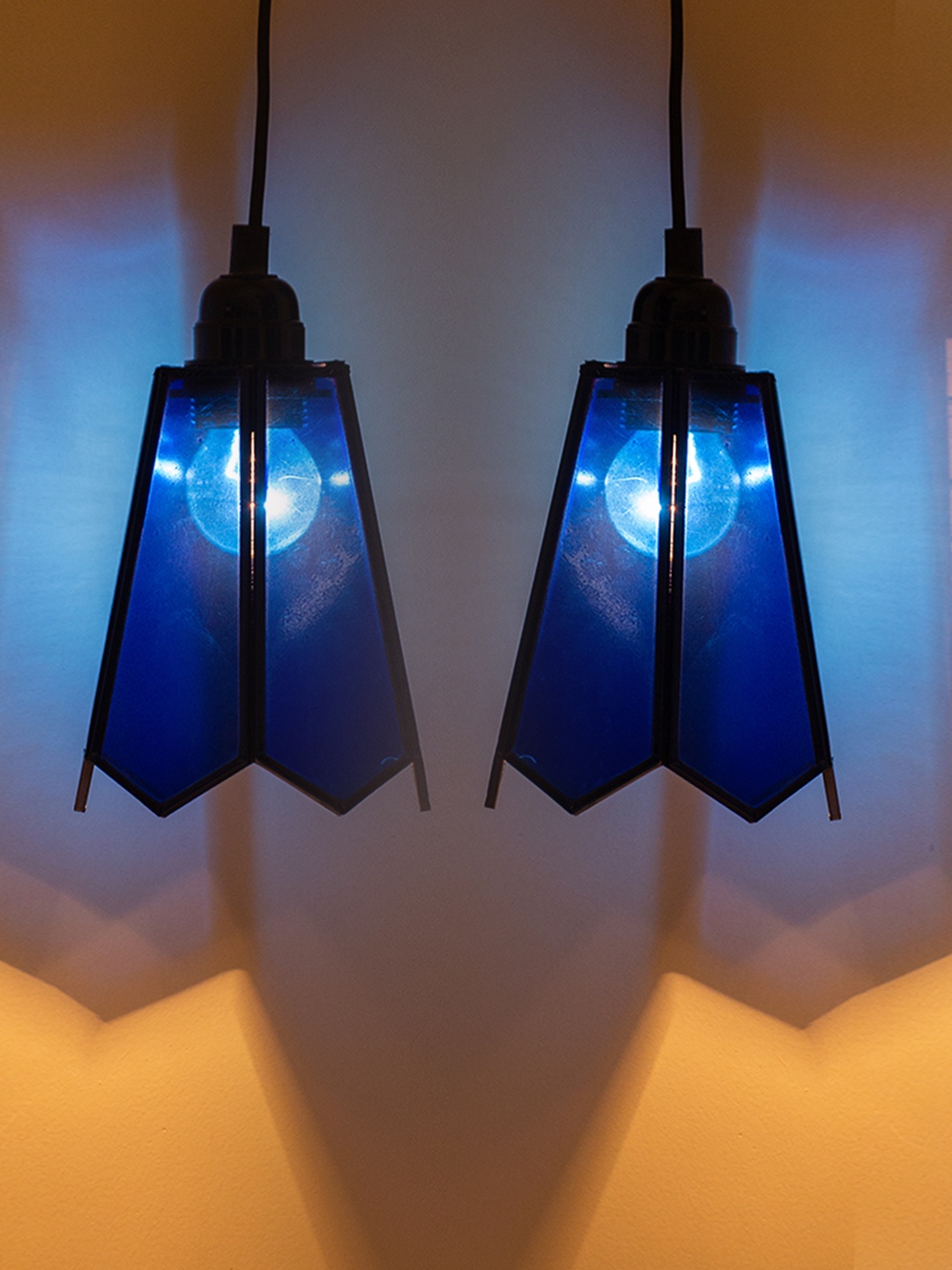 ExclusiveLane Blue 2 Pieces Glass Splendours Cuboidal Hanging Iron Pendant Ceiling Lamps
ExclusiveLane Blue 2 Pieces Glass Splendours Cuboidal Hanging Iron Pendant Ceiling Lamps