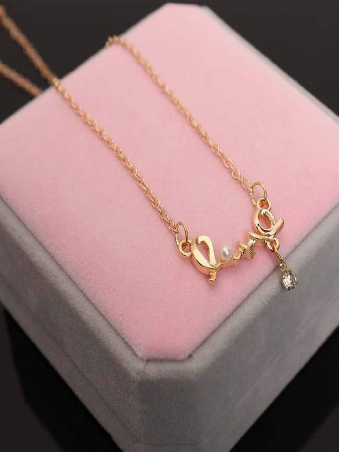 Mahi Gold-Plated Stone-Studded & Pearl Beaded Pendant With Chain
Mahi Gold-Plated Stone-Studded & Pearl Beaded Pendant With Chain