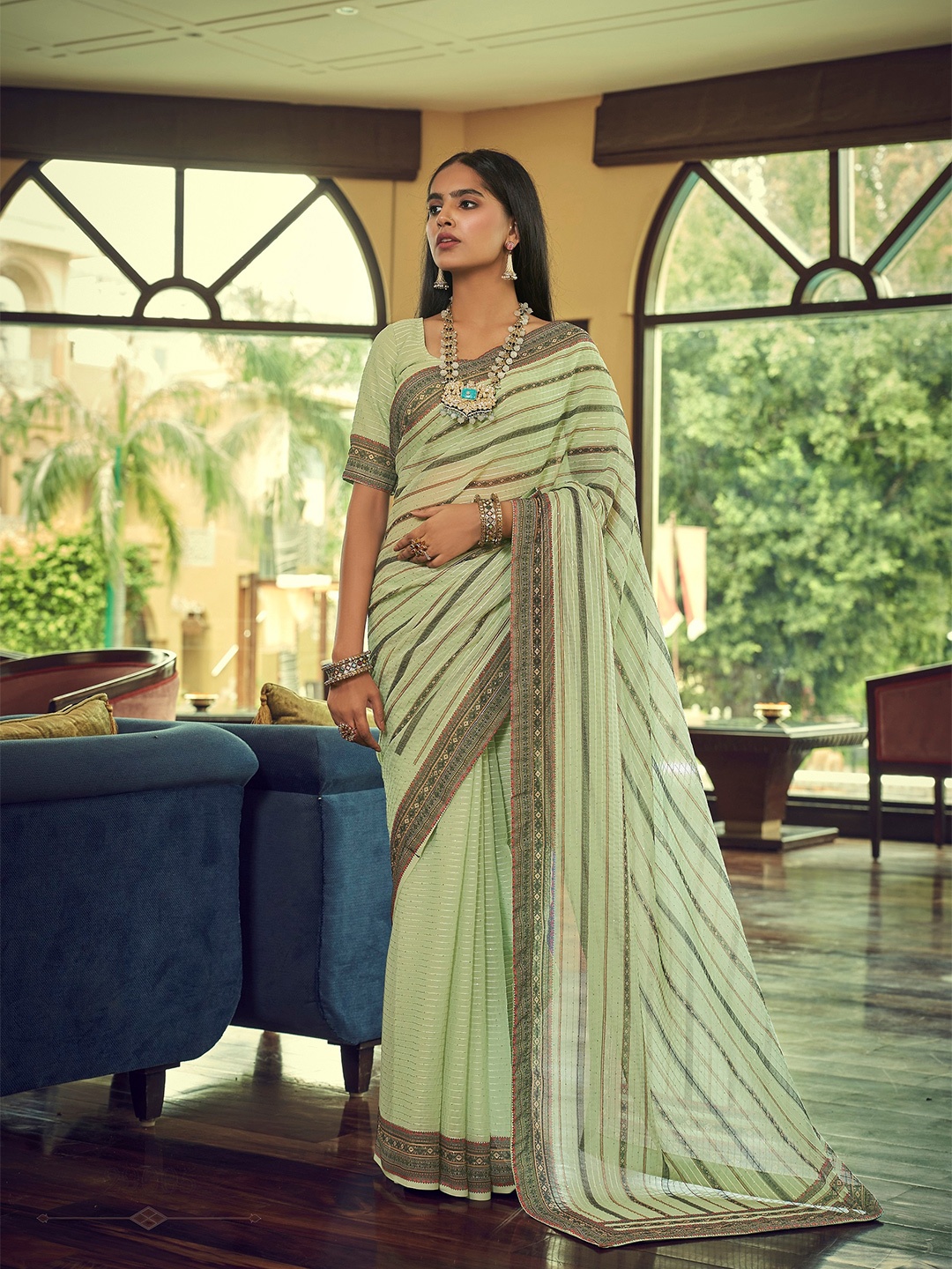 Vrundavan ethics Green & Coral Striped Sequinned Pure Georgette Leheriya Saree