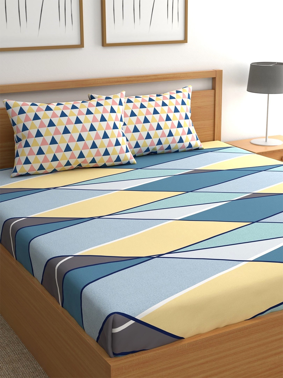 CHHAVI INDIA Blue & Yellow Geometric Ultra Soft 210 TC King Bedsheet with 2 Pillow Covers
CHHAVI INDIA Blue & Yellow Geometric Ultra Soft 210 TC King Bedsheet with 2 Pillow Covers