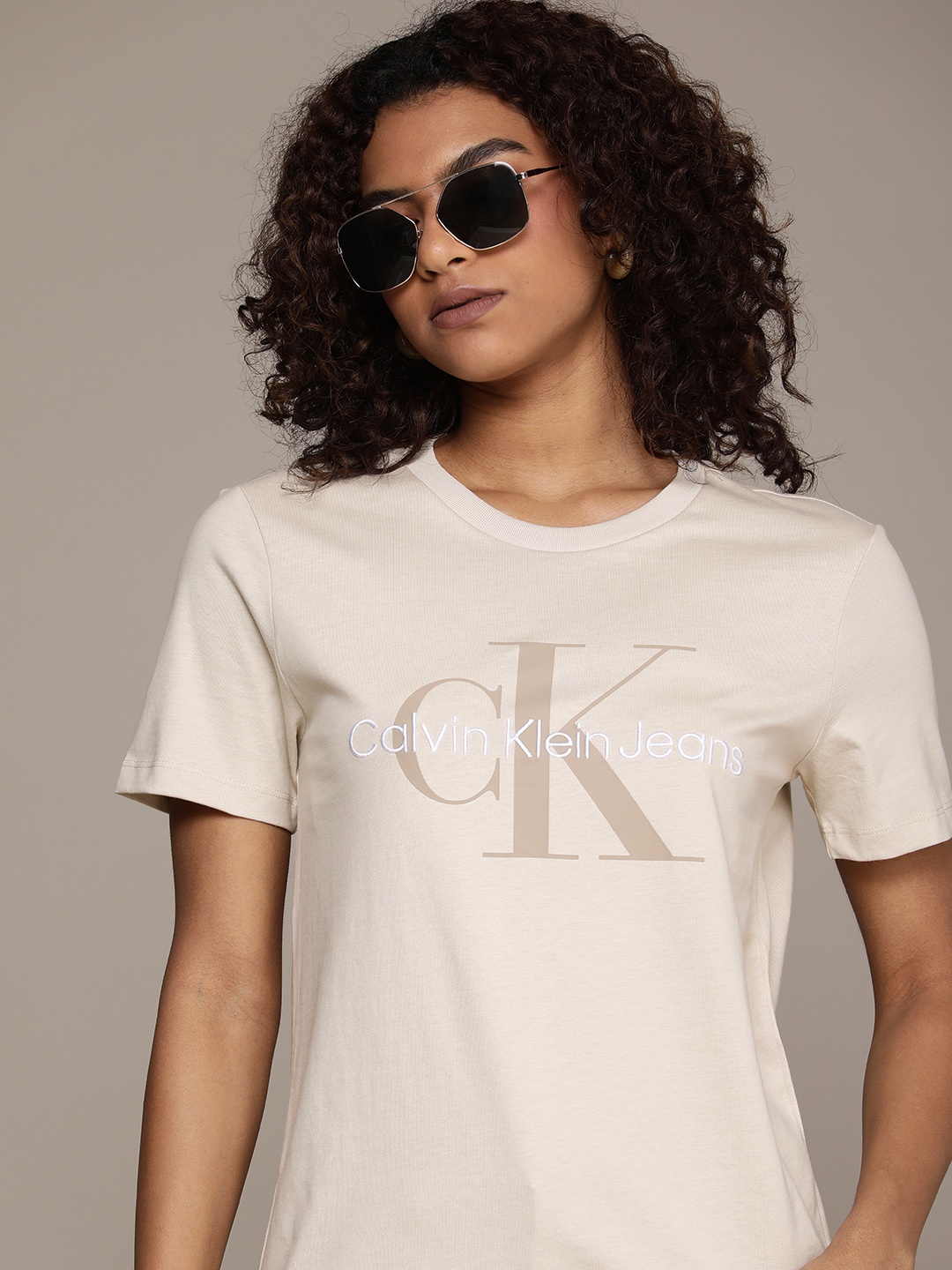 Calvin Klein Jeans Women Brand Logo Print & Embroidered Knitted Pure Cotton T-shirt, Beige
Calvin Klein Jeans Women Brand Logo Print & Embroidered Knitted Pure Cotton T-shirt, Beige