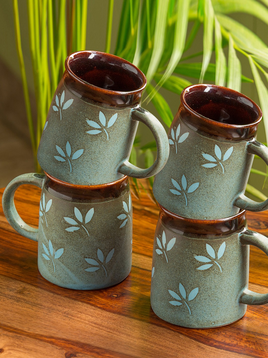 ExclusiveLane Set of 4 Leaf Sips Handglazed Studio Pottery Ceramic Coffee Mugs, Green
ExclusiveLane Set of 4 Leaf Sips Handglazed Studio Pottery Ceramic Coffee Mugs, Green