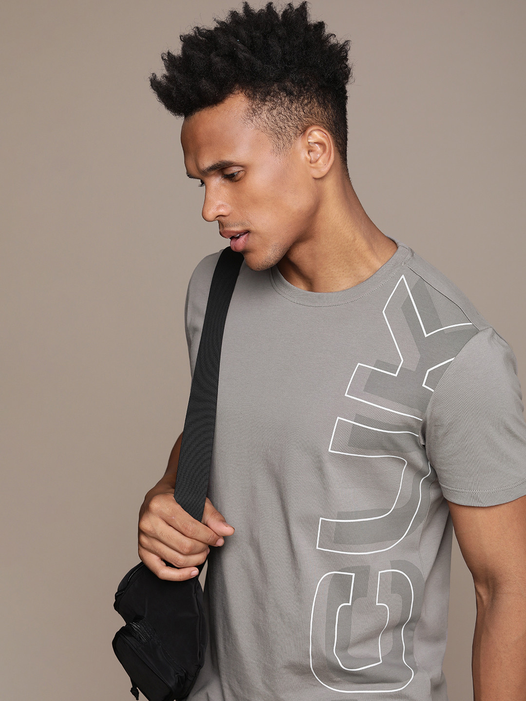 FCUK Men Brand Logo Printed Drop-Shoulder Sleeves Pure Cotton T-shirt, Grey 
FCUK Men Brand Logo Printed Drop-Shoulder Sleeves Pure Cotton T-shirt, Grey