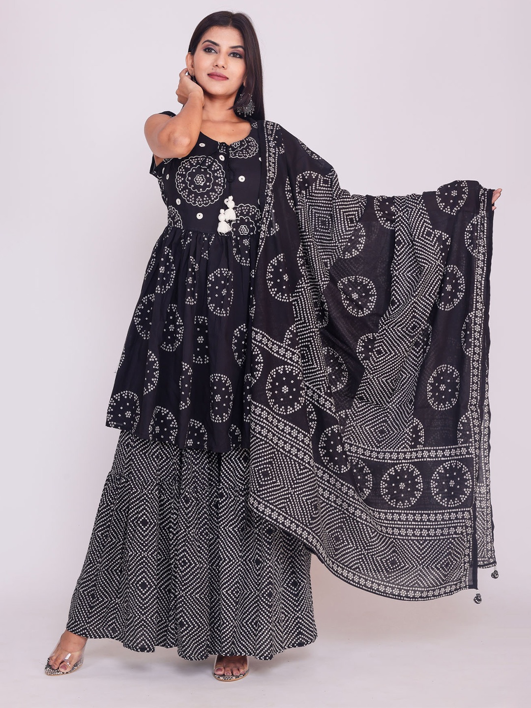 FASHION DWAR Women Bandhani Embroidered Panelled Pure Cotton Kurta With Sharara & Dupatta, Black
FASHION DWAR Women Bandhani Embroidered Panelled Pure Cotton Kurta With Sharara & Dupatta, Black