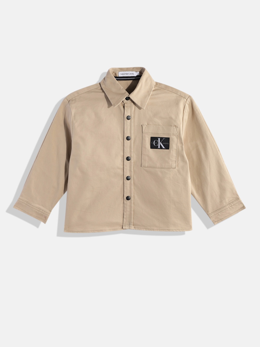 Calvin Klein Boys Solid Opaque Casual Shirt With Chest Pocket & Brand Logo Applique Detail, Beige
Calvin Klein Boys Solid Opaque Casual Shirt With Chest Pocket & Brand Logo Applique Detail, Beige