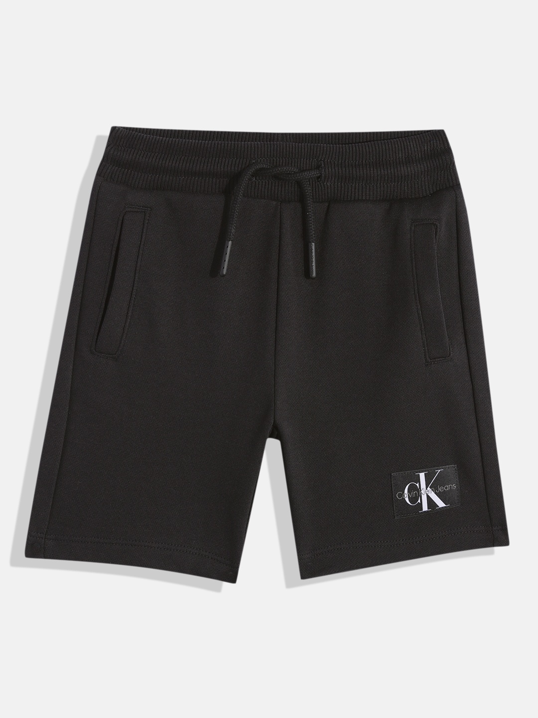 Calvin Klein Jeans Boys Solid Regular Fit Mid-Rise Knitted Organic Cotton Regular Shorts, Black
Calvin Klein Jeans Boys Solid Regular Fit Mid-Rise Knitted Organic Cotton Regular Shorts, Black