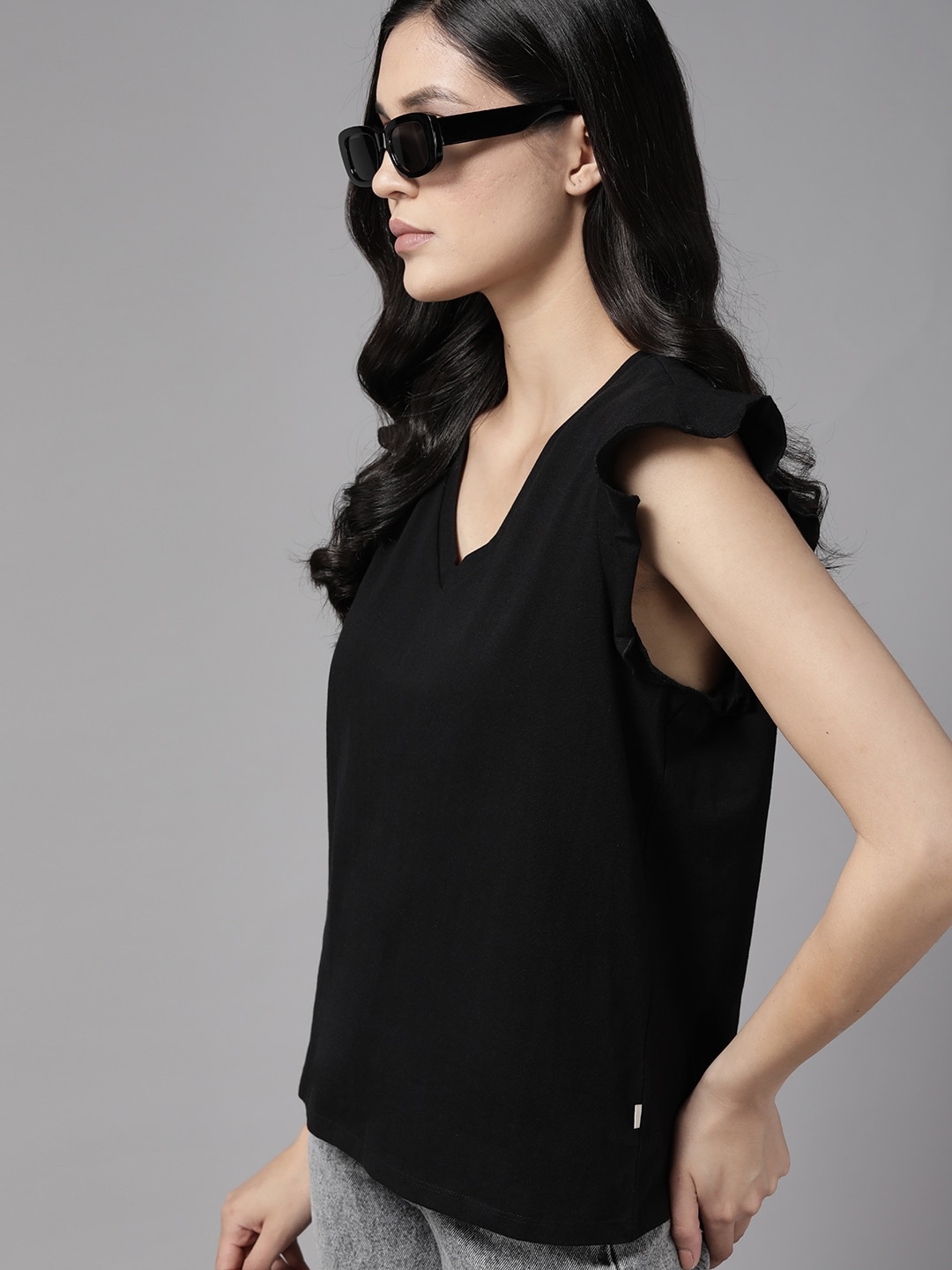 The Roadster Lifestyle Co. V-Neck Ruffles Detailed Sleeves Relaxed Fit Cotton T-shirt, Black
The Roadster Lifestyle Co. V-Neck Ruffles Detailed Sleeves Relaxed Fit Cotton T-shirt, Black