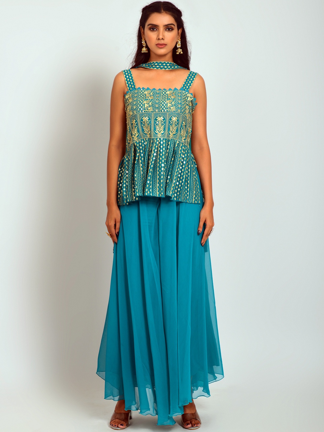 ASPORA Women Floral Embroidered Empire Sequinned Top with Sharara & With Dupatta, Turquoise blue
ASPORA Women Floral Embroidered Empire Sequinned Top with Sharara & With Dupatta, Turquoise blue