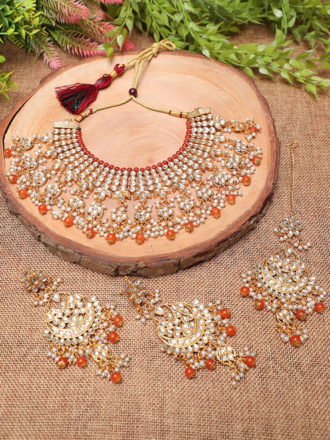 Swarajshop Women Gold-Plated Kundan Studded & Pearl Beaded Jewellery Set, White
Swarajshop Women Gold-Plated Kundan Studded & Pearl Beaded Jewellery Set, White