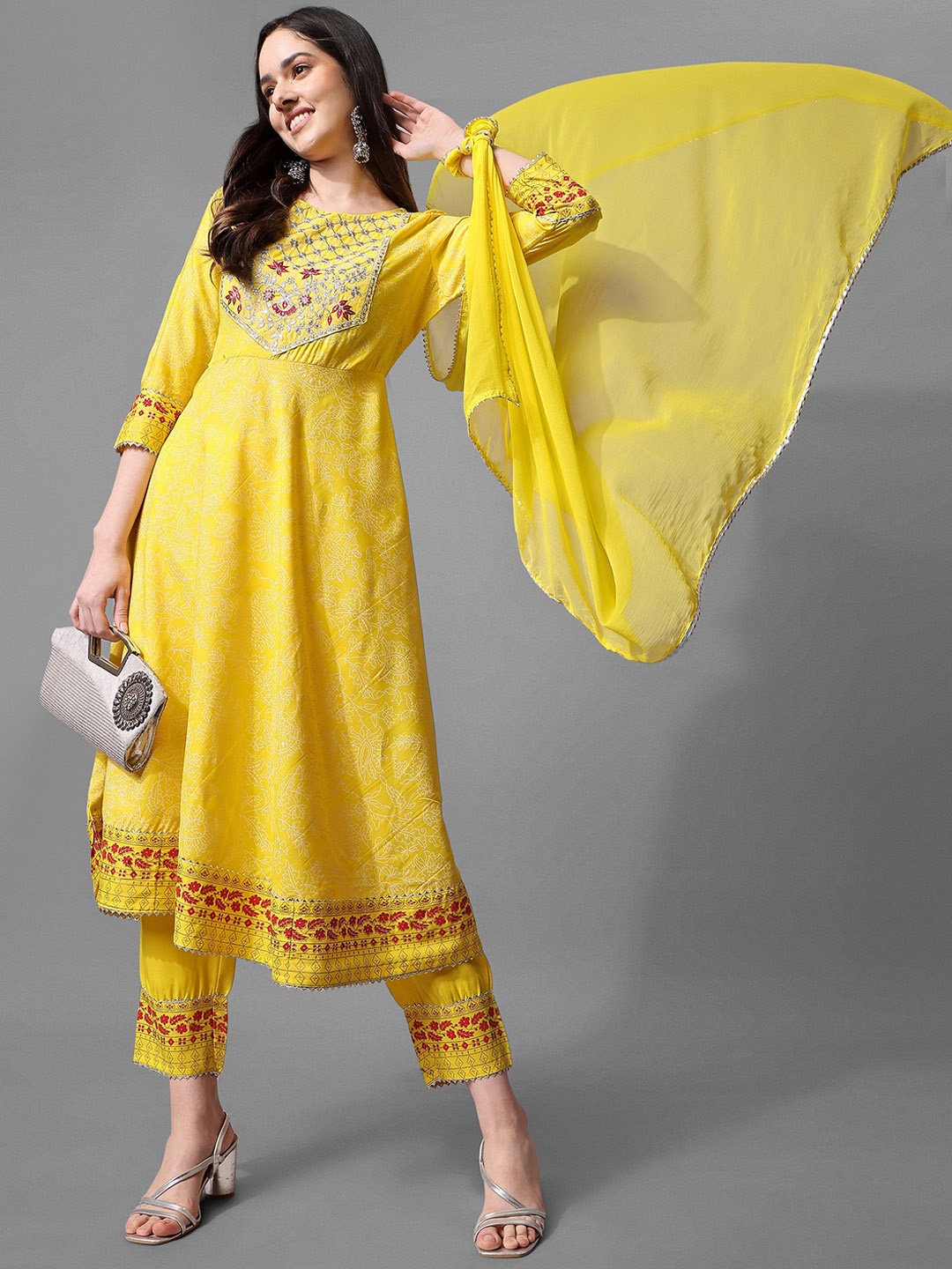 ASPORA Floral Embroidered Empire Sequinned Kurta with Trousers & With Dupatta, Yellow
ASPORA Floral Embroidered Empire Sequinned Kurta with Trousers & With Dupatta, Yellow