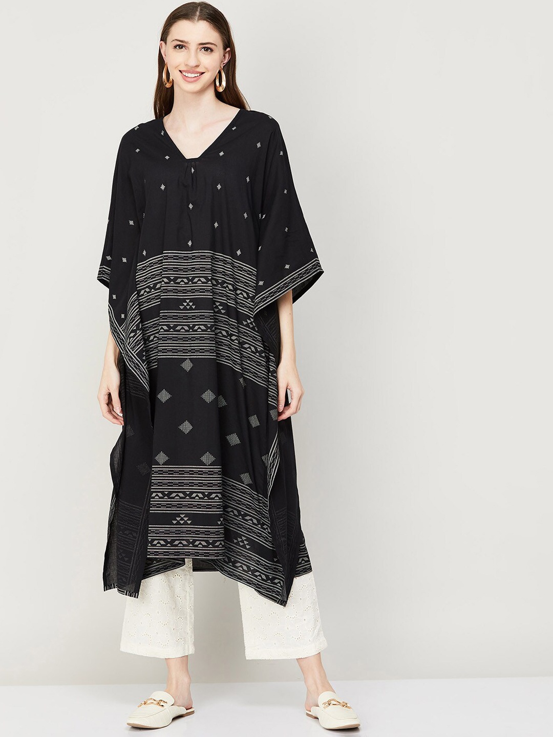 Melange by Lifestyle Women Ethnic Motifs Printed Flared Sleeves Kaftan Cotton Kurta, Black
Melange by Lifestyle Women Ethnic Motifs Printed Flared Sleeves Kaftan Cotton Kurta, Black