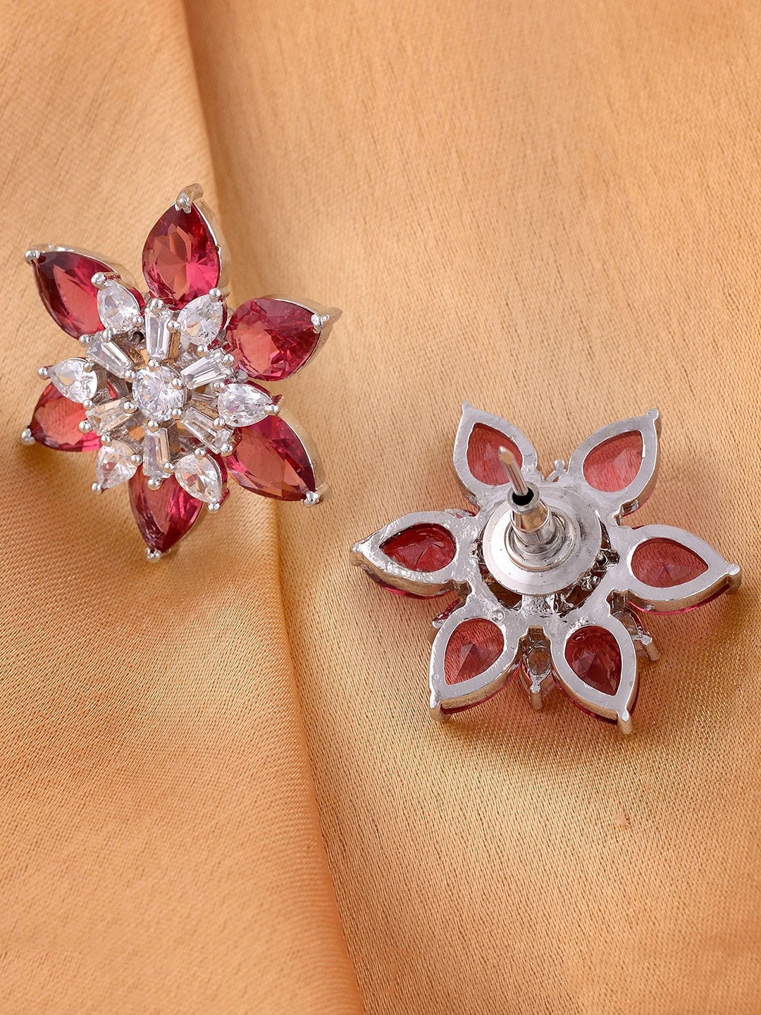 Saraf RS Jewellery Rhodium-Plated American Diamond studded Floral Shaped Studs Earrings, Magenta
Saraf RS Jewellery Rhodium-Plated American Diamond studded Floral Shaped Studs Earrings, Magenta